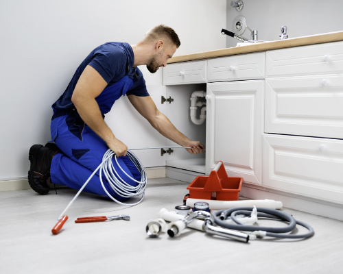 Plumber-Cleaning-Clogged