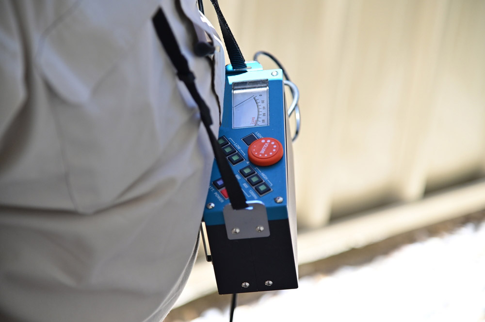 Straight Shooter technician using acoustic leak detection equipment