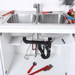 exposed kitchen plumbing