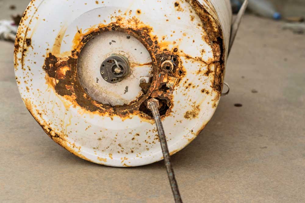 old, rusty water heater tank