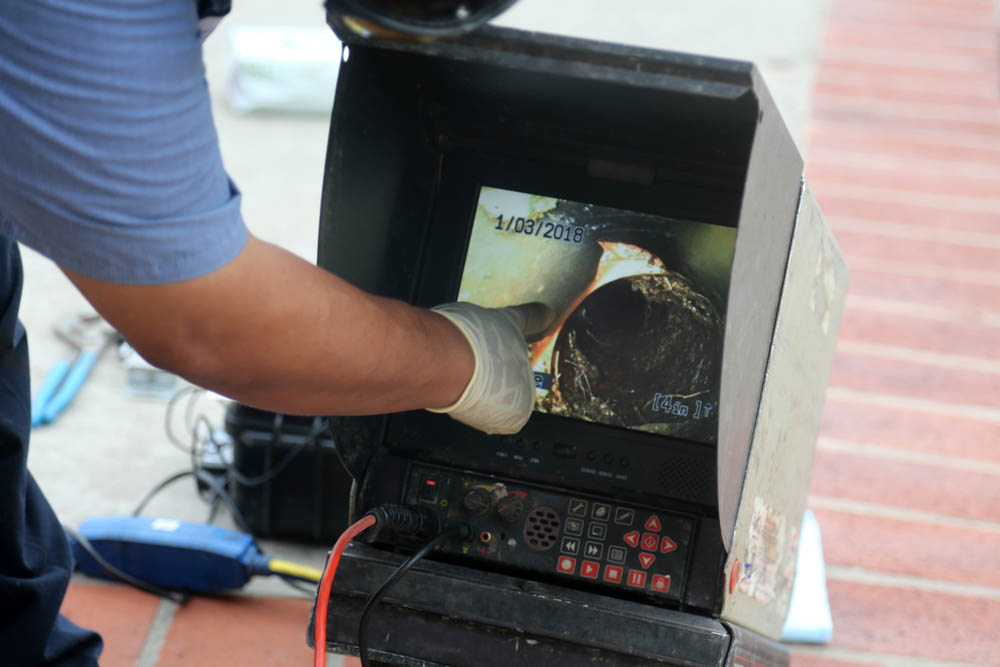 live feed from a sewer camera inspection monitor