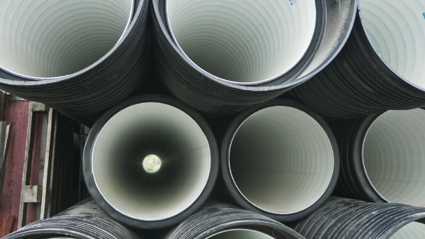 commercial corrugated sewer pipes stacked